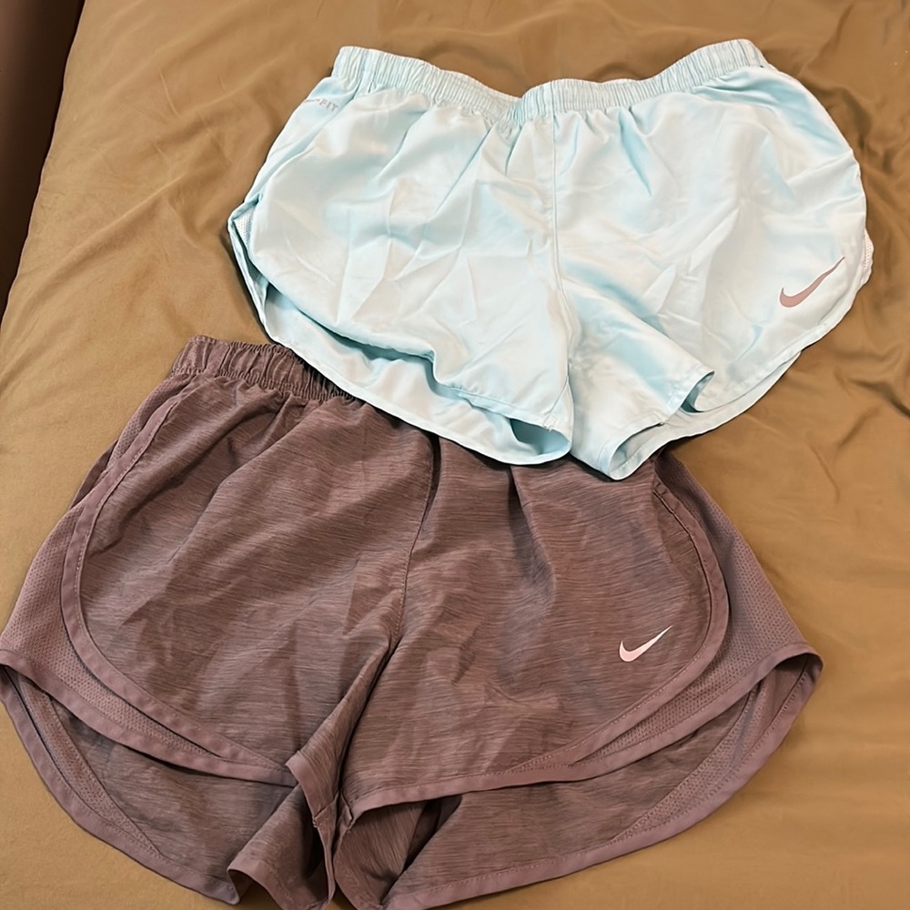 • 2 pairs of size small nike dri-fit shorts •